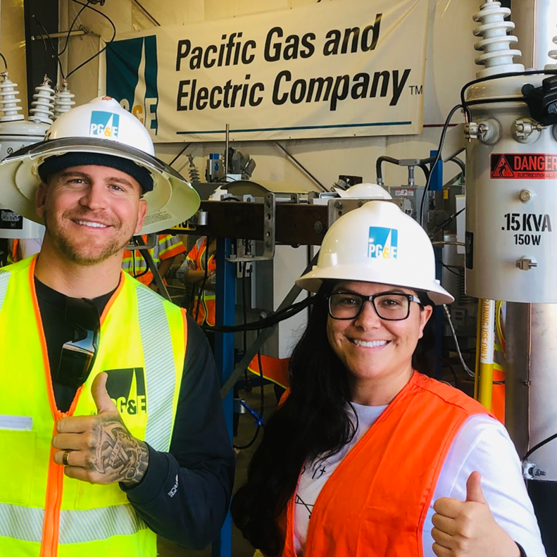 PGE225 A high school student and PG&E worker inside a power plant